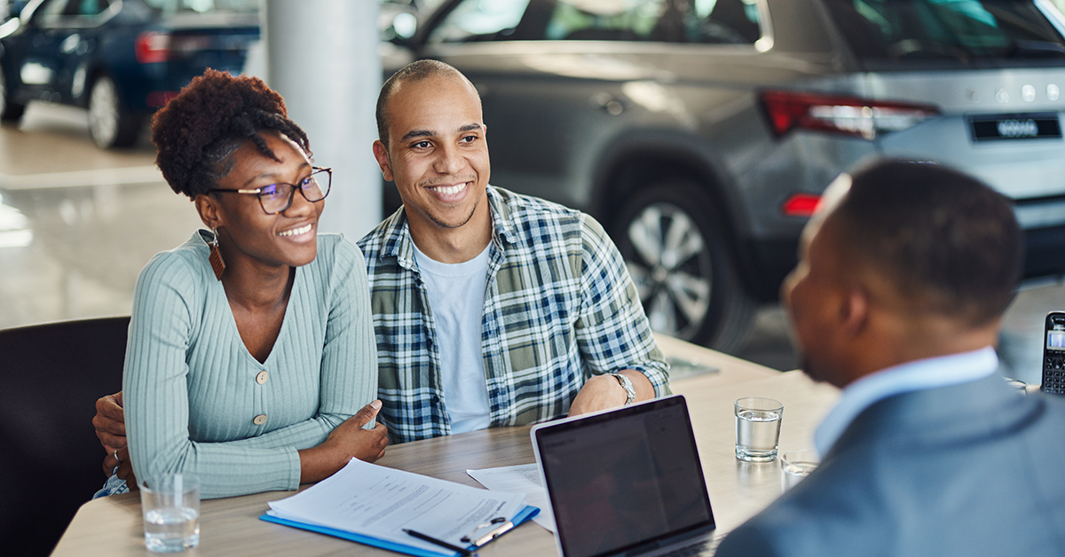 couple-at-dealership